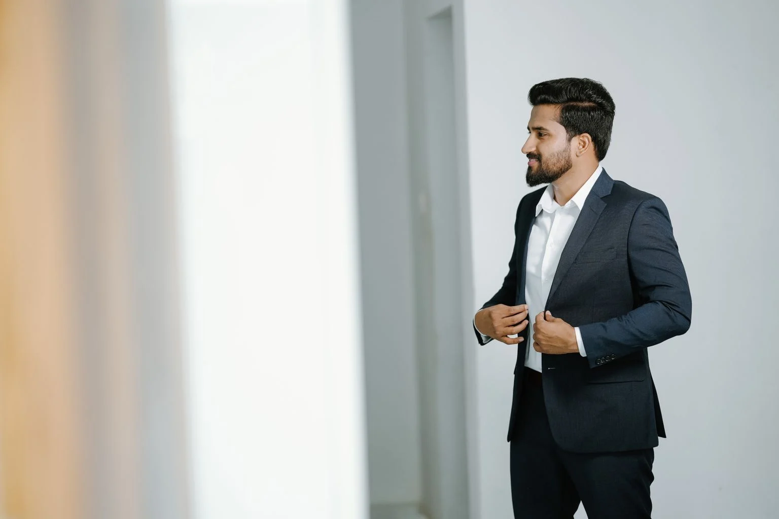 Indian executive in a tailored suit for corporate gifting